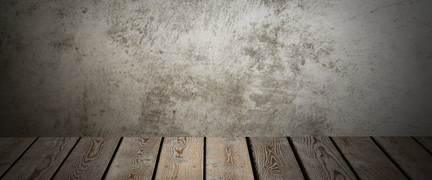 木制的装饰桌子在灰色的垃圾背景上。图片下载