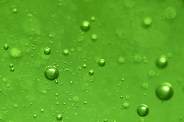 绿色碟肥皂泡沫气球极端微距离拍摄抽象背景图片下载