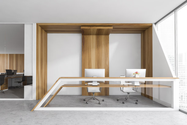 白色木制的前台，靠近窗户的地方有电脑图片下载