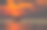 夕阳下渔船的剪影。素材图片