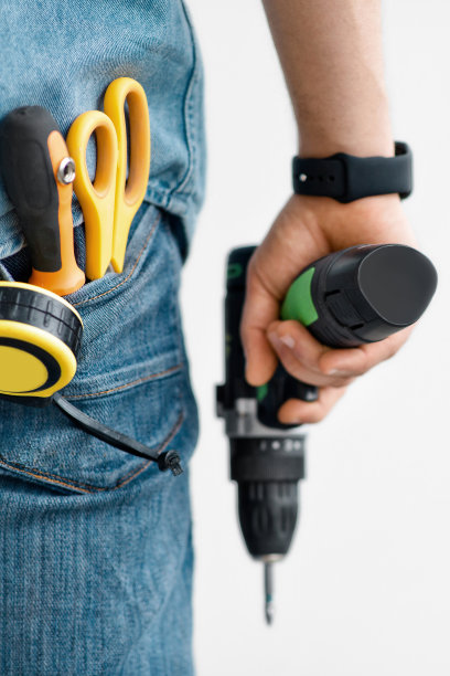 电动工具修理和专业建筑工或杂工的工作图片下载