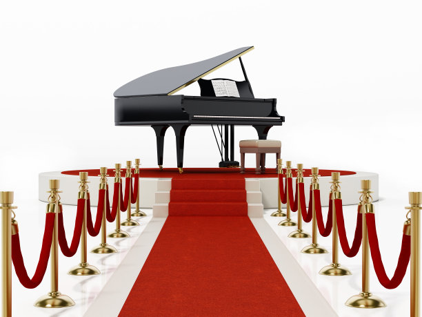 红地毯和天鹅绒绳索通向舞台上的音乐会钢琴图片下载