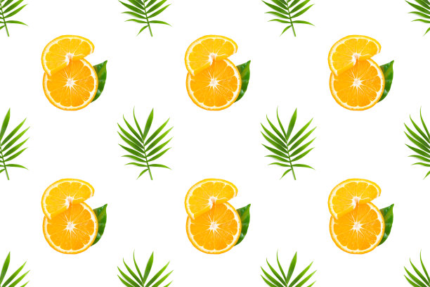 橙色水果和棕榈叶的无缝图案。图片下载