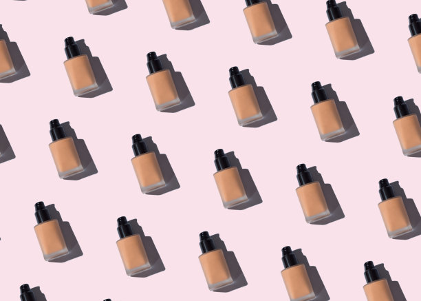 将粉底玻璃瓶图案涂在粉色上图片下载