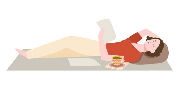 女人仰卧在地毯上，读着文字昏昏欲睡图片下载