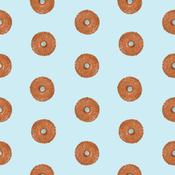 无缝图案的甜甜圈与巧克力和棕色的点缀图片下载