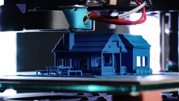 3d打印机打印蓝房子的特写图片下载