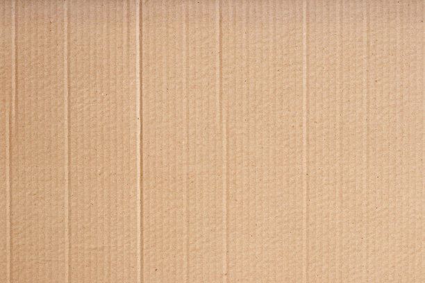 棕色硬纸板抽象背景，纹理回收纸盒在旧的复古模式设计艺术作品。图片下载