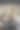 漂亮的，年轻的女人，戴着时尚的，现代的黑色眼镜坐在一个可持续发展的办公室，工作与风车风力涡轮机模型图片下载