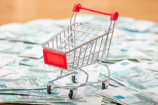 购物车与一个红色把手上的背景1000卢布钞票。图片下载