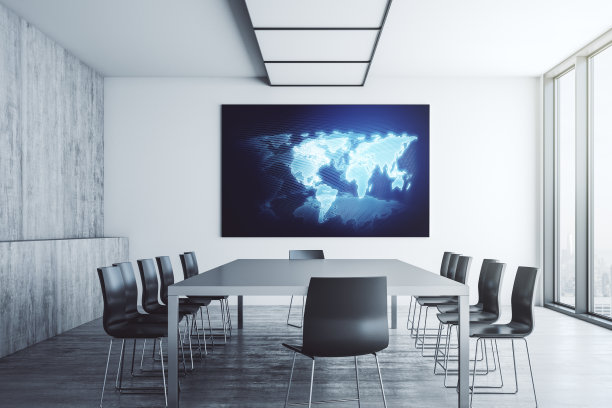 抽象图形世界地图展示显示器在现代会议室，连接和沟通的概念。三维渲染图片下载
