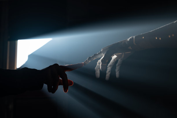 人类手指触摸机器人手指图片下载