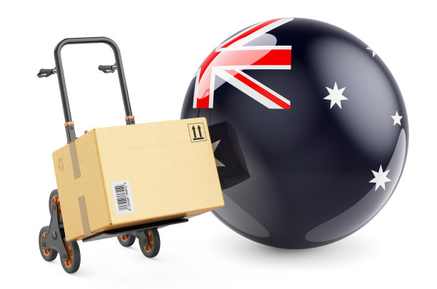 手提车上有澳洲国旗的包裹。航运在澳大利亚，概念。3D渲染孤立的白色背景图片下载