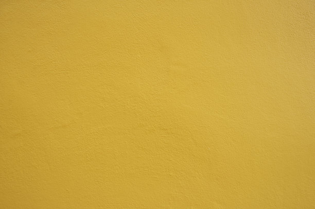 黄色的墙壁纹理作为背景图片下载