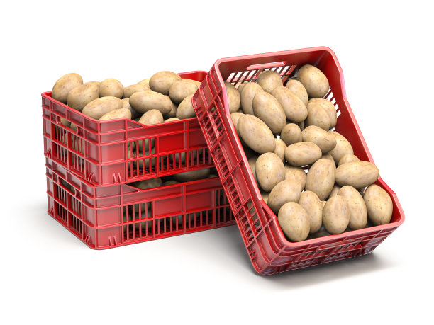 装在塑料箱里的土豆，用白色隔离。图片下载