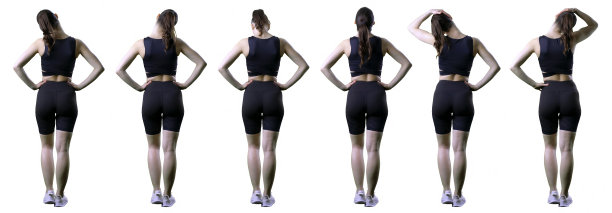 一组运动的年轻女子站和做颈部伸展运动。后视图。图片下载