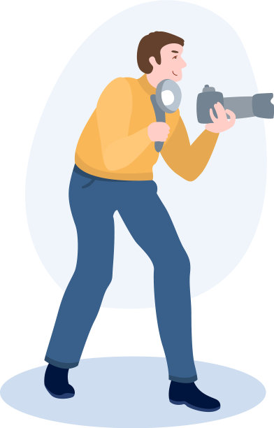 爱好照相机和闪光灯的摄影师图片下载