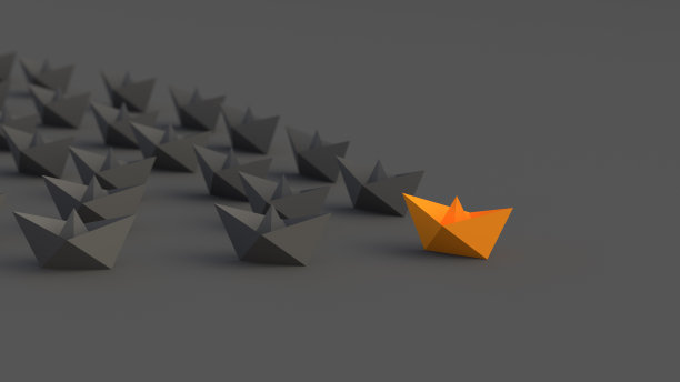 领导概念，橙色的领导船领导黑色的船，在黑色的背景图片下载