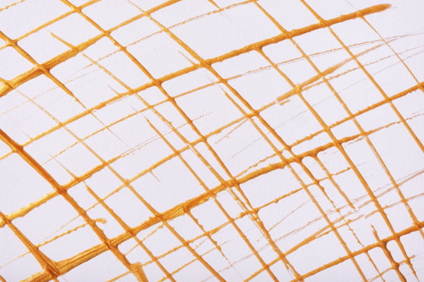 白色的背景上画着细细的金色线条和水花。抽象艺术背景与黄色画笔装饰笔触。图片下载