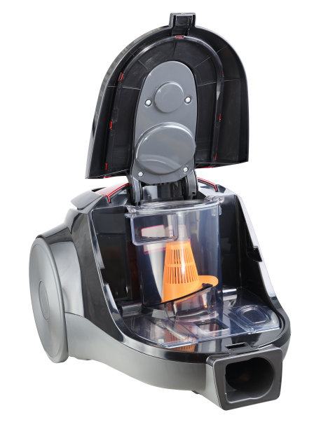 真空吸尘器孤立地展开在白色背景上。在真空吸尘器中小心清洁垃圾和灰尘容器。图片下载