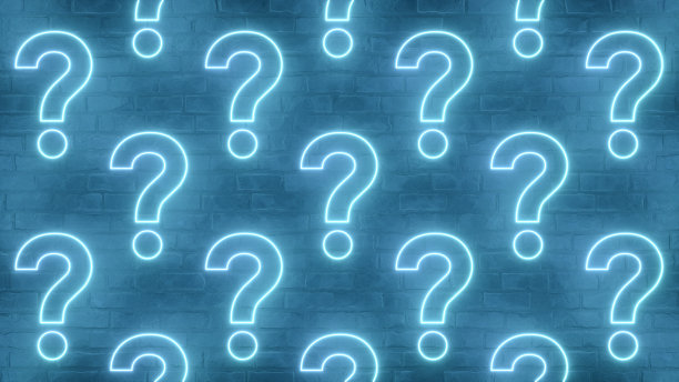 砖墙上的问号霓虹灯图片下载