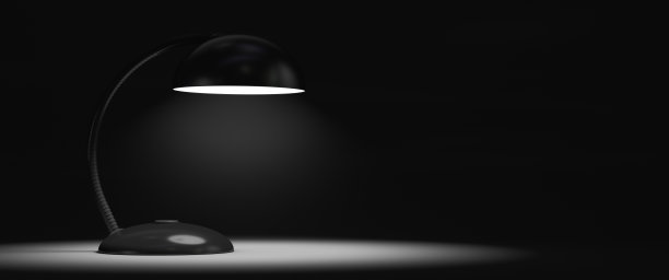 台灯开着。一个黑暗的房间。副本的空间。图片下载
