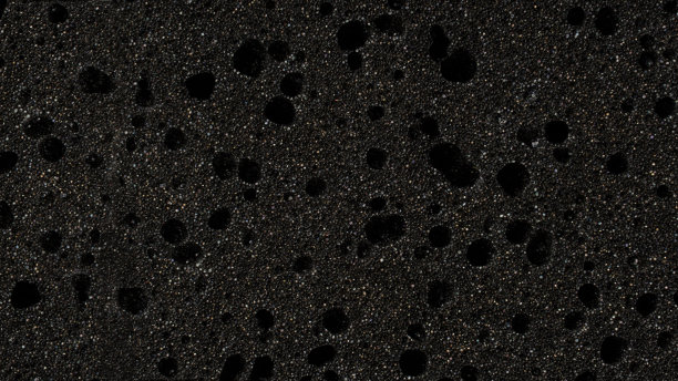 柔软多孔纹理作为背景。黑色多孔背景图片下载