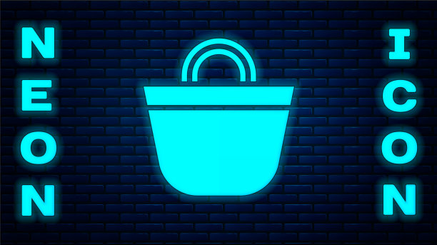 发光的霓虹灯沙滩包图标孤立在砖墙上图片下载