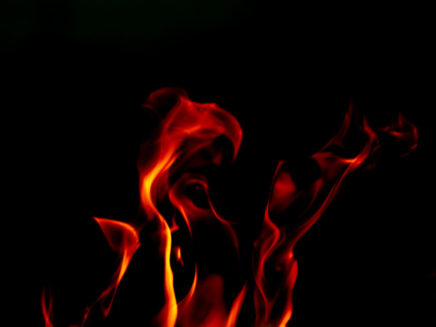 火焰火焰燃烧发光的黑色背景，美丽的抽象火焰熊熊燃烧的orane和红色火焰显示高和力量的能量，照片美丽的图形创意设计火焰墙纸和图案图片下载