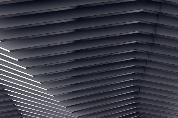 建筑的背景。现代金属拱形构图的透视。半圆的形状。光在最后。壁纸的屏幕图片下载