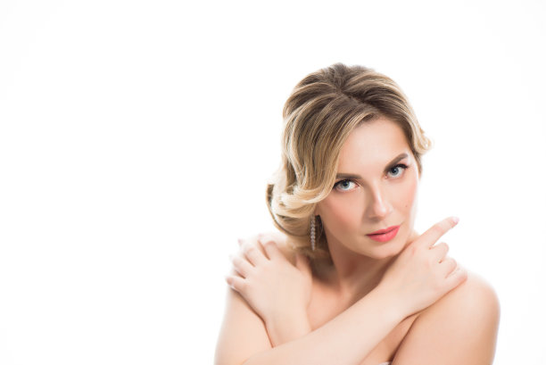 白底金发女性。青春护肤理念。图片下载