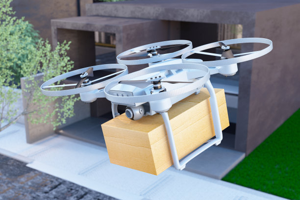 送货无人机在房屋上空飞行图片下载