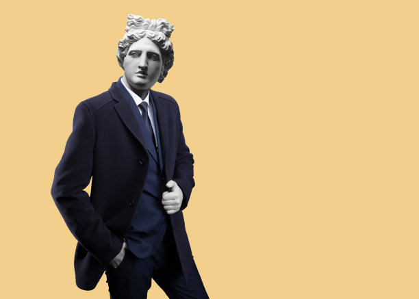 现代艺术拼贴。概念肖像时尚男子在外套。阿波罗的石膏头。图片下载