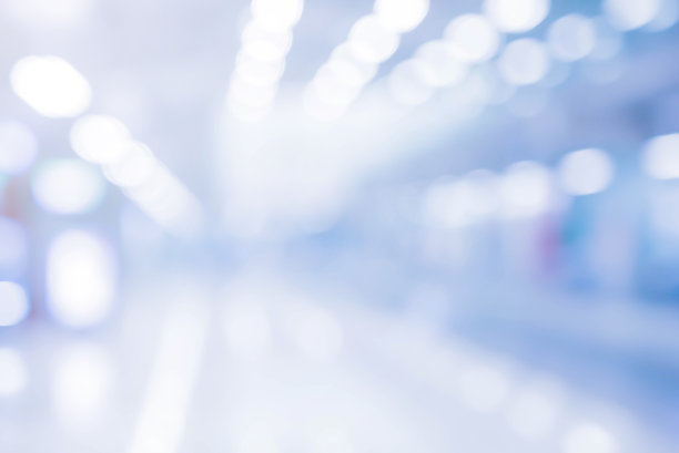 抽象模糊的现代室内家庭办公室以电子灯的灯光为背景进行设计横幅和呈现概念图片下载