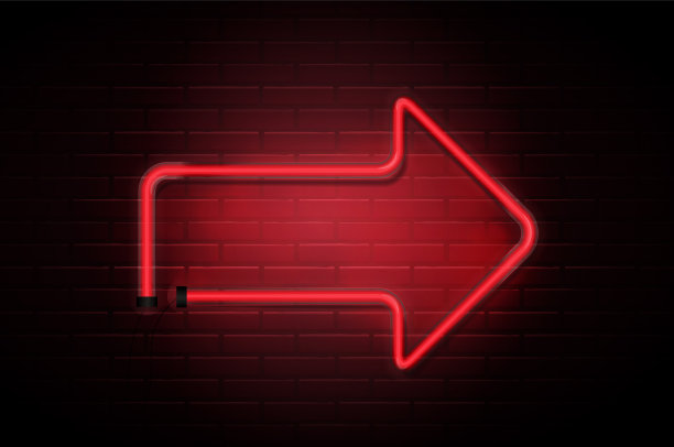 暗色砖墙上的霓虹红色箭头管图片下载