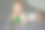 可爱的婴儿微笑和玩球在灰色的床库存照片图片下载