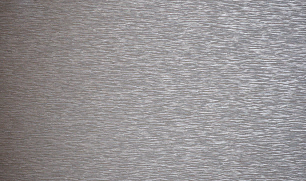 深灰色金属的粗糙表面，有特殊的砂痕。图片下载