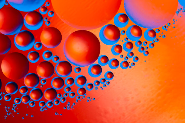 抽象背景与彩色渐变颜色。油滴在水中抽象的迷幻图案形象。图片下载