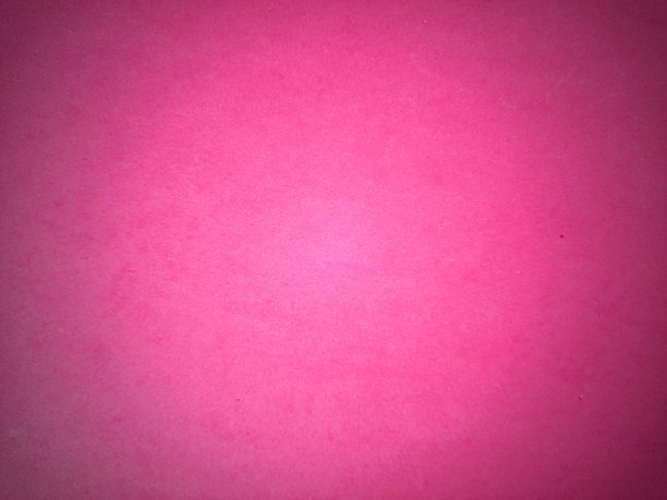 明亮的粉红色背景，接近丁香和紫红色。边缘周围的暗光晕。背景，贺卡或爱情宣言。图片下载