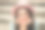 照片的梦幻，体贴的年轻女子穿着蓝绿色夹克眼镜，坐在楼梯，手臂下巴户外城市城市图片下载