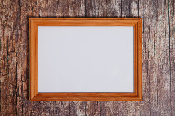 木质背景上的空波西米亚风格相框图片下载