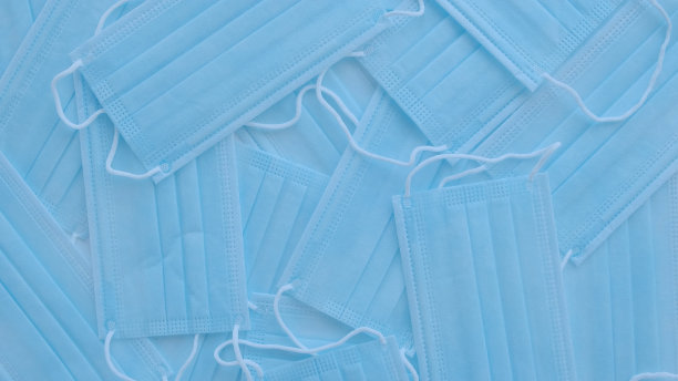 外科防护口罩的背景。全球冠状病毒大流行- Covid-19图片下载