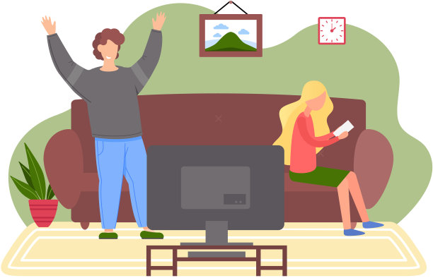 一对夫妇坐在沙发上看电影图片下载