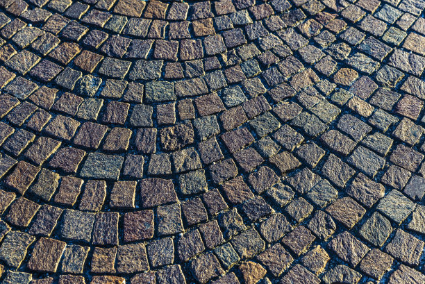 街道铺路石作为背景在那不勒斯，意大利图片下载