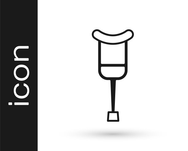 黑色拐杖或拐杖图标孤立的白色背景。肌肉骨骼系统疾病患者的康复设备。向量图片下载