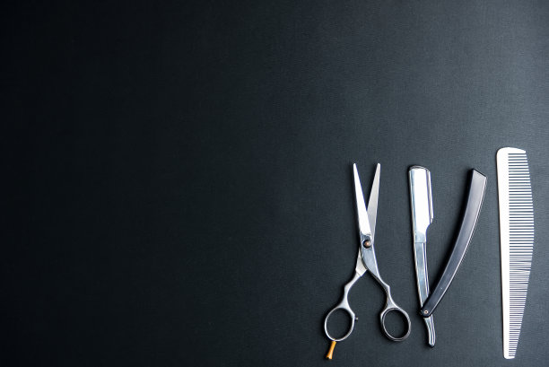 时尚的专业理发剪刀，理发和细化。美容的概念。美丽的概念。美容工具的概念图片下载