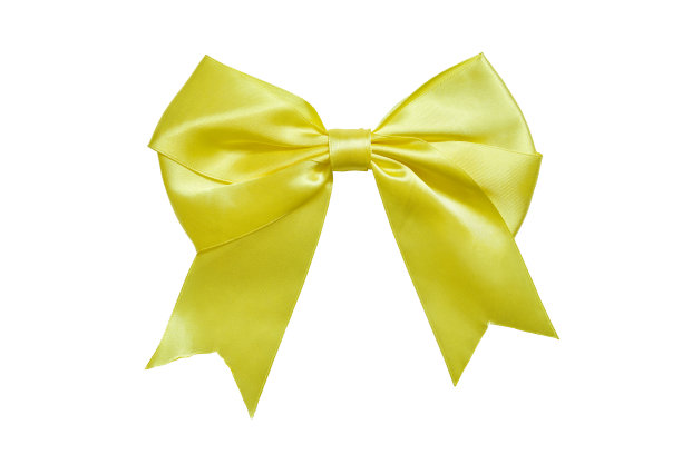 大亮黄色蝴蝶结由缎子宽缎带在白色的背景图片下载