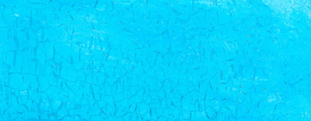 墙壁表面的旧油漆破裂了。蓝色背景。剥落的油漆。乡村蓝色垃圾材料的图案图片下载