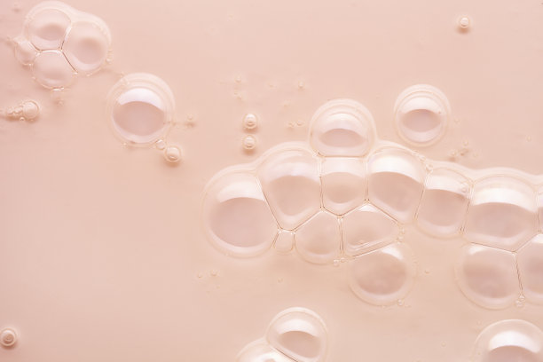 液体绿松石绿色，黄色，米黄色，橙色，紫色，粉红色，冷蓝色凝胶或油精华血清乳剂，白色和多色孤立背景图片下载