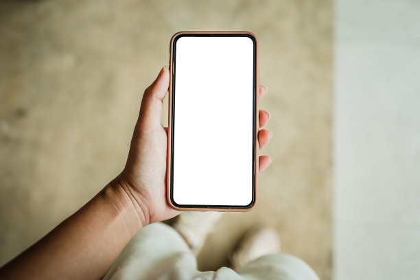 女人的手握着手机空白拷贝空白屏幕。具有科技概念的智能手机图片下载